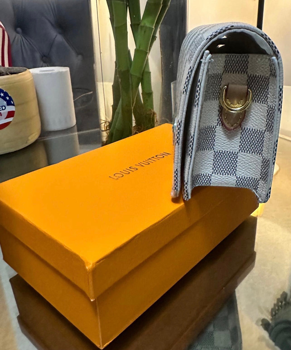 small modern grey and white LV bag