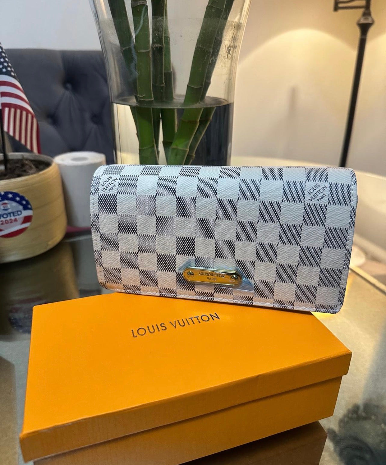 small modern grey and white LV bag