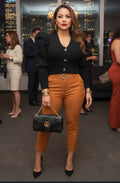 Chic high-waisted skinny trousers in a vibrant orange pants