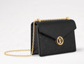 Black and gold strap bag