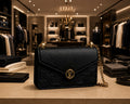 Black and gold strap bag